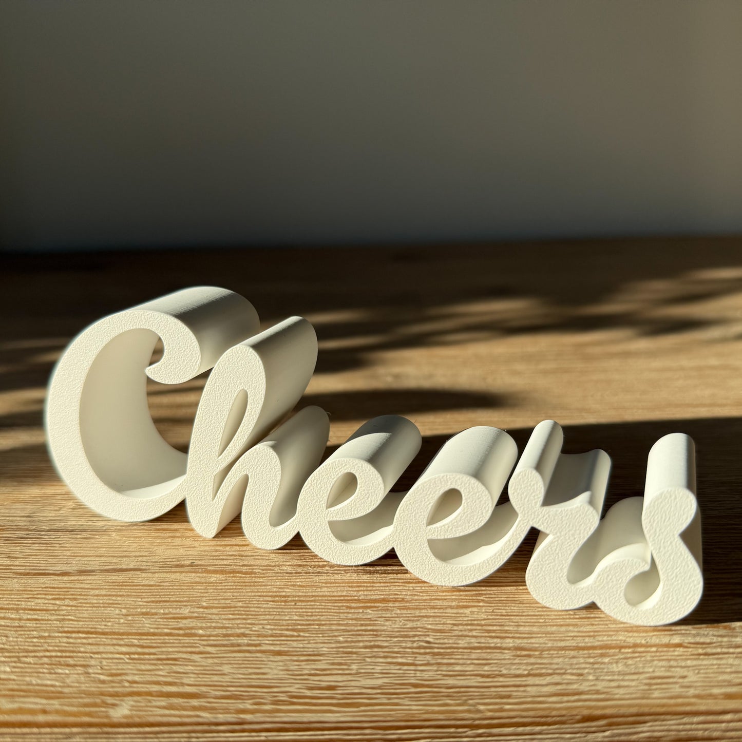 Schriftzug "Cheers"
