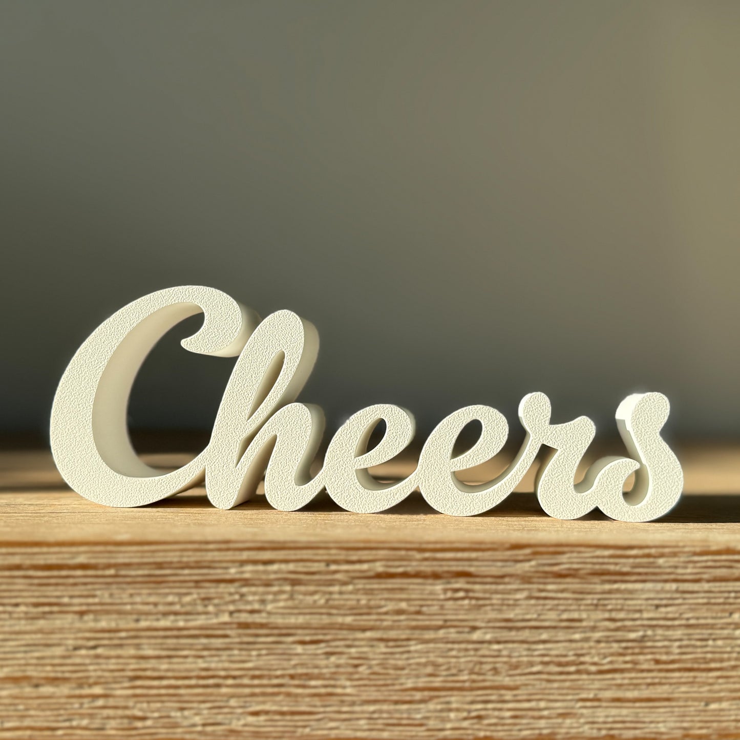 Schriftzug "Cheers"
